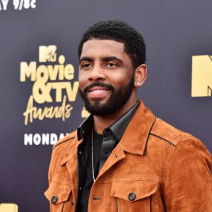 SANTA MONICA, CA - JUNE 16:  Basketball player Kyrie Irving attends the 2018 MTV Movie And TV Awards at Barker Hangar on June 16, 2018 in Santa Monica, California.  (Photo by Alberto E. Rodriguez/Getty Images for MTV)